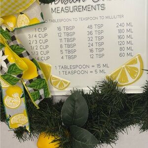 Kitchen Conversion Sign with Lemon Accent Bow. 16 inches round.